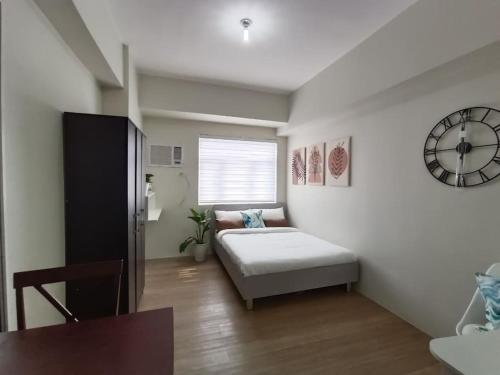 Llit o llits en una habitació de Vista GL Taft Studio Unit
