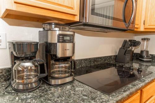a coffee maker sitting on a counter in a kitchen at Large Family Home with Game Room in Page
