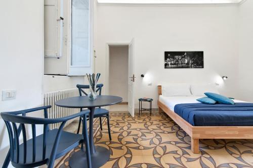 Postel nebo postele na pokoji v ubytování Liberty Rooms