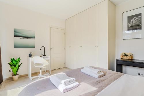 Posteľ alebo postele v izbe v ubytovaní Zygmunta Slominskiego 5 - P&O Apartments