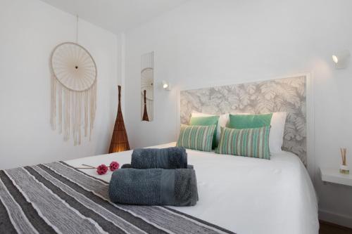 Ένα ή περισσότερα κρεβάτια σε δωμάτιο στο Casa Alisios