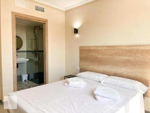 Ένα ή περισσότερα κρεβάτια σε δωμάτιο στο Hotel Marina Elche
