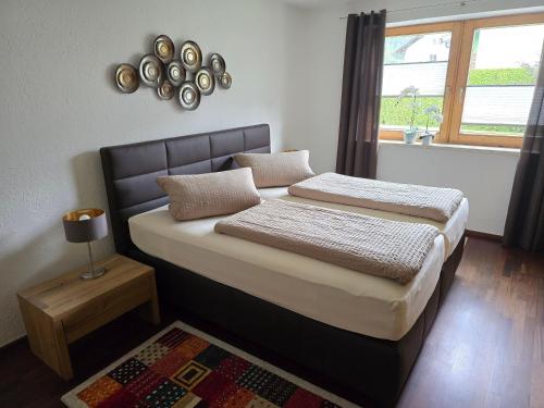 A bed or beds in a room at Ferienhaus Fießmann