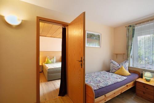 Postel nebo postele na pokoji v ubytování Ferienwohnung Shaun