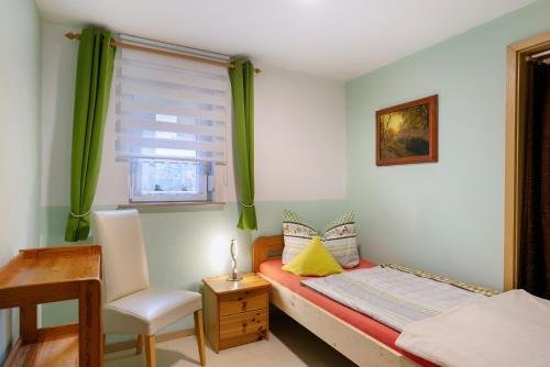 Postel nebo postele na pokoji v ubytování Ferienwohnung Shaun