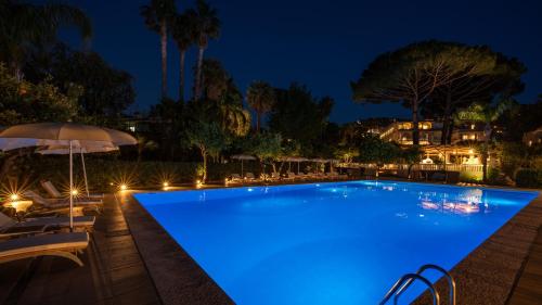 Bazén v ubytování Grand Hotel Cocumella nebo v jeho okolí