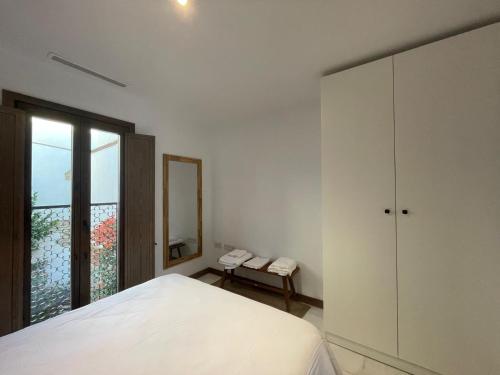 Posteľ alebo postele v izbe v ubytovaní La Casa de la escalera 1 derecha