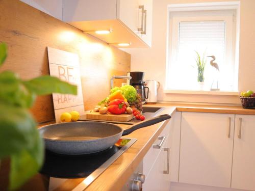 Dapur atau dapur kecil di Ferienwohnung Dat Mutt