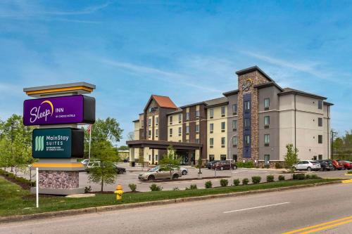 a rendering of the exterior of a hotel at MainStay Suites Bowling Green North in Bowling Green