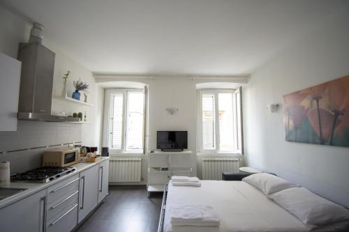Η κουζίνα ή μικρή κουζίνα στο RivApartments