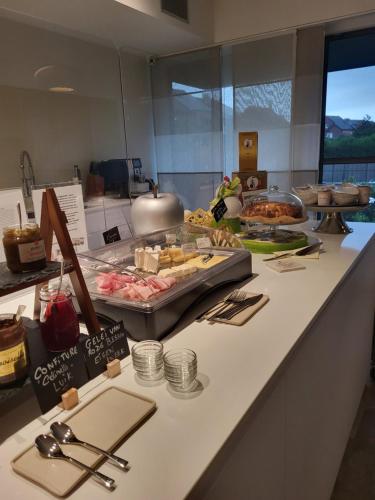 a buffet line with many different types of food at B&B Atuatuca in Tongeren