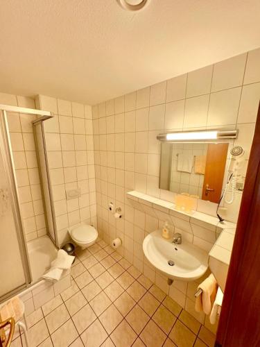 Ein Badezimmer in der Unterkunft Pension Alter Kutschenbauer