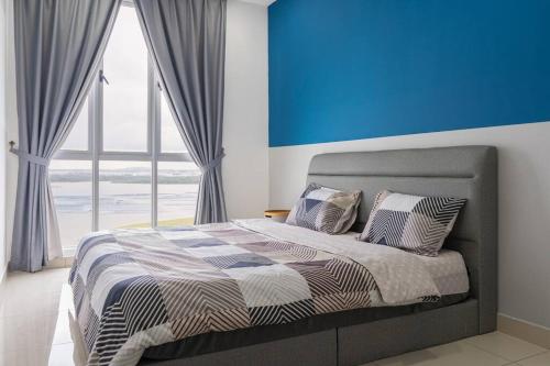 Katil atau katil-katil dalam bilik di Perfect Seaview Sunset- 3BR - 8pax Masai