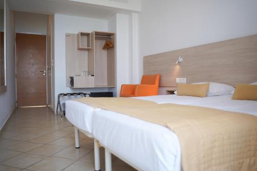 Postel nebo postele na pokoji v ubytování HOTEL SISSY