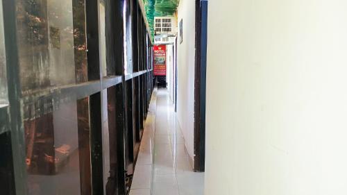 a hallway of a store with a hallwayngthngthngthngthngthngthngthngth at Hotel Maharaja Inn By The Premium Villa in New Delhi