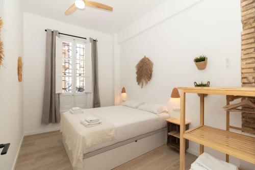 Postel nebo postele na pokoji v ubytování Illetes Flats -Apartamento con mucho encanto
