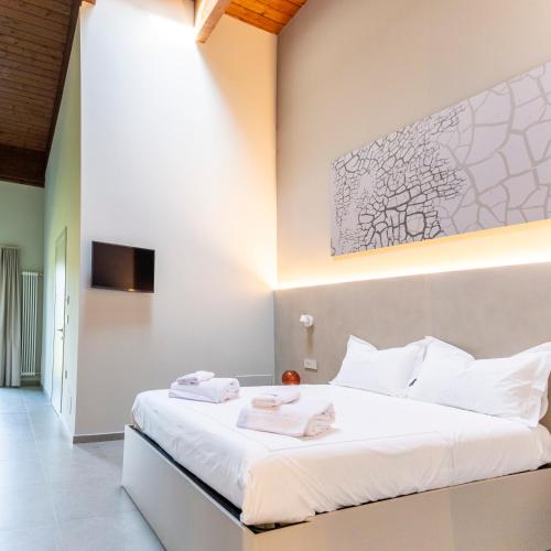 Ένα ή περισσότερα κρεβάτια σε δωμάτιο στο Agriturismo Demarie