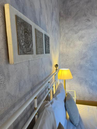 Postel nebo postele na pokoji v ubytování Le Ginestre