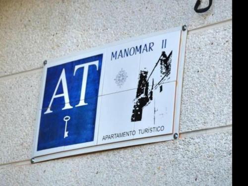 a sign on the side of a building at Manomar II, tu refugio en Gata in Gata