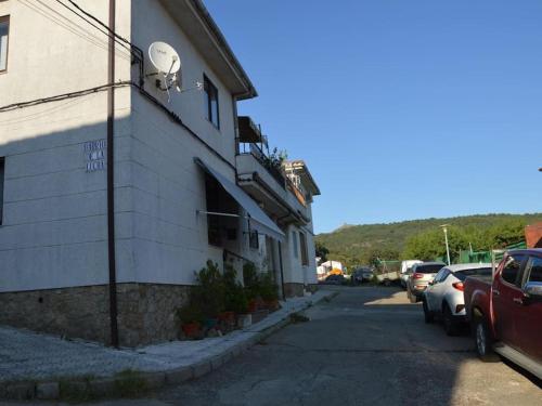 a building with a security camera on the side of it at Manomar II, tu refugio en Gata in Gata