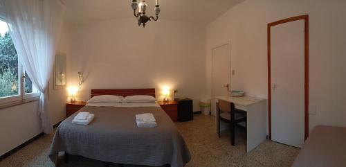 Ένα ή περισσότερα κρεβάτια σε δωμάτιο στο BeeLiving Room&Breakfast
