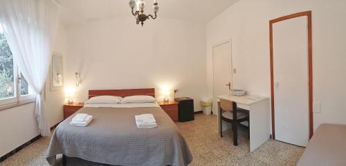 Ένα ή περισσότερα κρεβάτια σε δωμάτιο στο BeeLiving Room&Breakfast