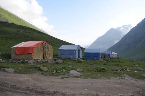 a group of tents on top of a mountain at Outdoor Adventures Camp Ratti Gali Lake in Shardi