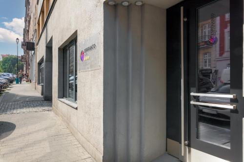 a building with a door on the side of a street at Esperanto Home in Katowice