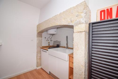 Η κουζίνα ή μικρή κουζίνα στο Plumera House