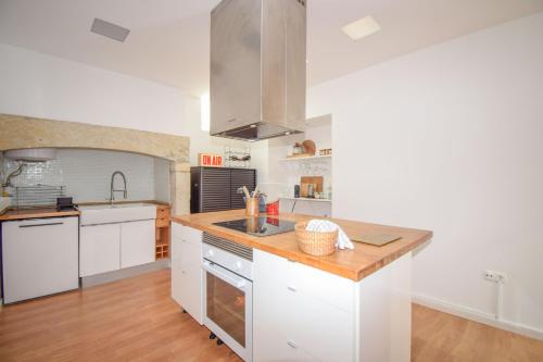 Η κουζίνα ή μικρή κουζίνα στο Plumera House
