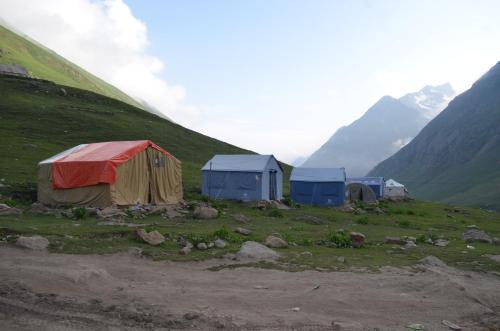 a group of tents on the side of a mountain at Outdoor Adventures Camp Ratti Gali Lake in Shardi
