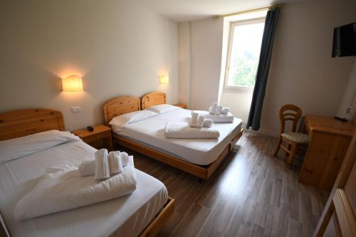 Hotel Saiseraにあるベッド