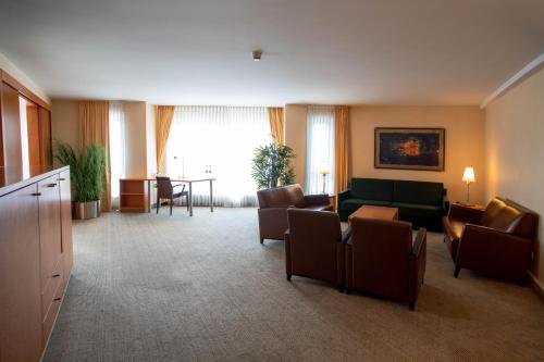 Best Western Premier Airporthotel Berlinにあるシーティングエリア
