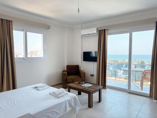 Ένα ή περισσότερα κρεβάτια σε δωμάτιο στο SEA View Studios LONG BEACH