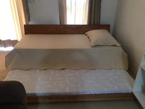 Ein Bett oder Betten in einem Zimmer der Unterkunft Taiba Beach Resort - Ap 106 BL A - IMOB TEMPORADA