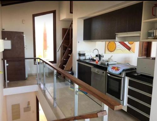 Küche/Küchenzeile in der Unterkunft CASA TAÍBA BEACH RESORT PÉ Na AREIA - IMOB TEMPORADA