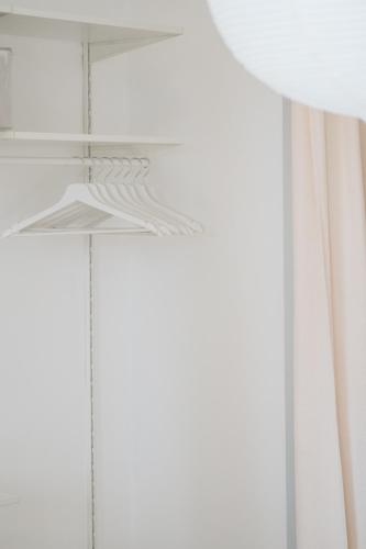 a closet with a white curtain and a window at Holiday House Aguacate 2 in San Sebastián de la Gomera