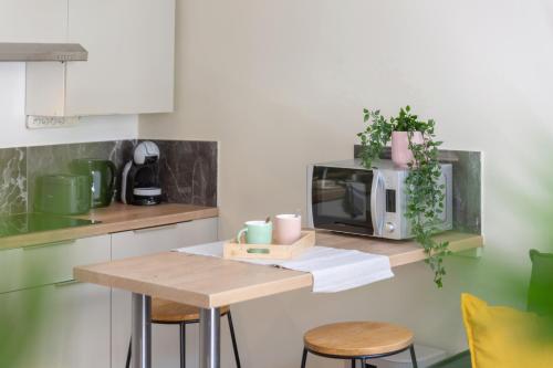 Escapade au port, Studio rénové, climatisé