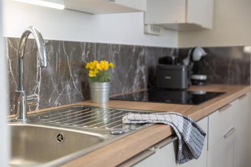 Køkken eller tekøkken på Escapade au port, Studio rénové, climatisé