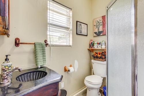 a bathroom with a sink and a toilet at 25 Mi to Starved Rock State Park - DePue Retreat in Spring Valley