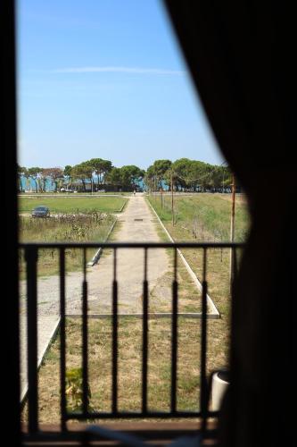 a view of an empty road from a window at Posh villa 1 in Kavajë