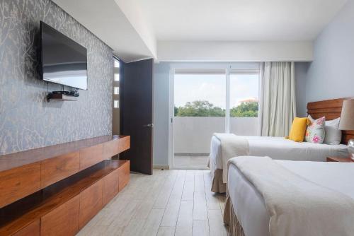 Ένα ή περισσότερα κρεβάτια σε δωμάτιο στο Casa Caleta ❂ Marina Private Dock