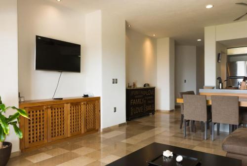 TV a/nebo společenská místnost v ubytování Costa Brava Apartments I Ocean Front