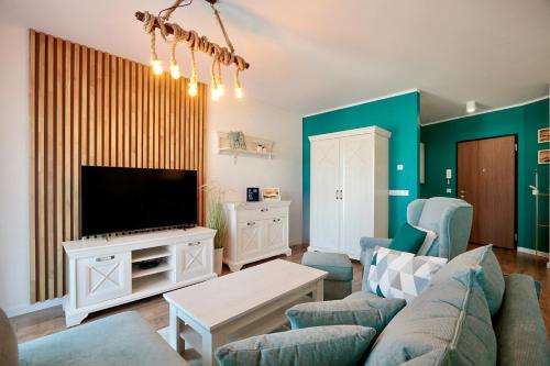 Μια τηλεόραση ή/και κέντρο ψυχαγωγίας στο Baltic Waves Resort by Baltic Home