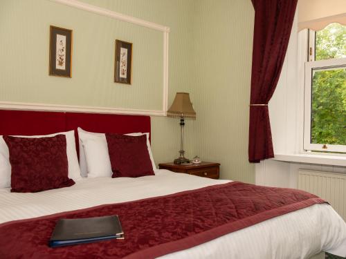Katil atau katil-katil dalam bilik di Ravenscourt House, Guest House