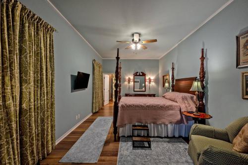 a bedroom with a bed and a couch at Entire Home! Fantastic Kitchen! 3 Full Baths in Mead