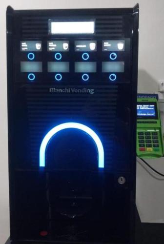 a close up of a computer screen with a phone at Pousada Do Futuro in Fortaleza