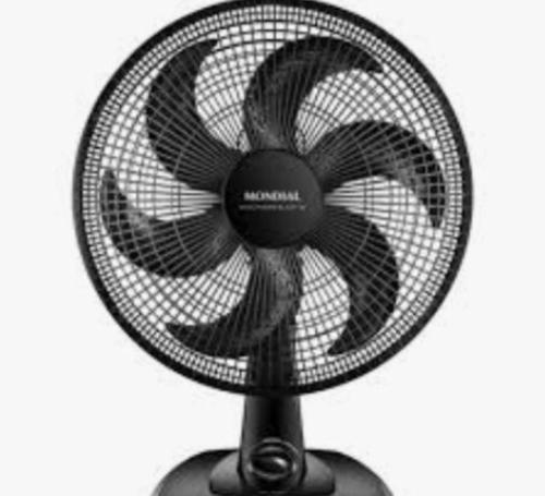 a black fan sitting on top of a table at Pousada Do Futuro in Fortaleza