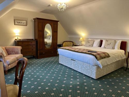 Postel nebo postele na pokoji v ubytování Ravenscourt House, Guest House