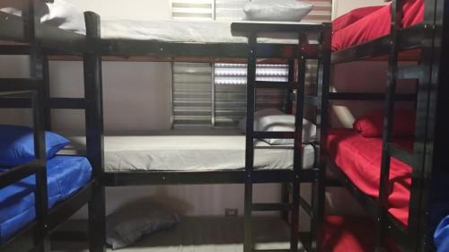Μία ή περισσότερες κουκέτες σε δωμάτιο στο TECH Hostel